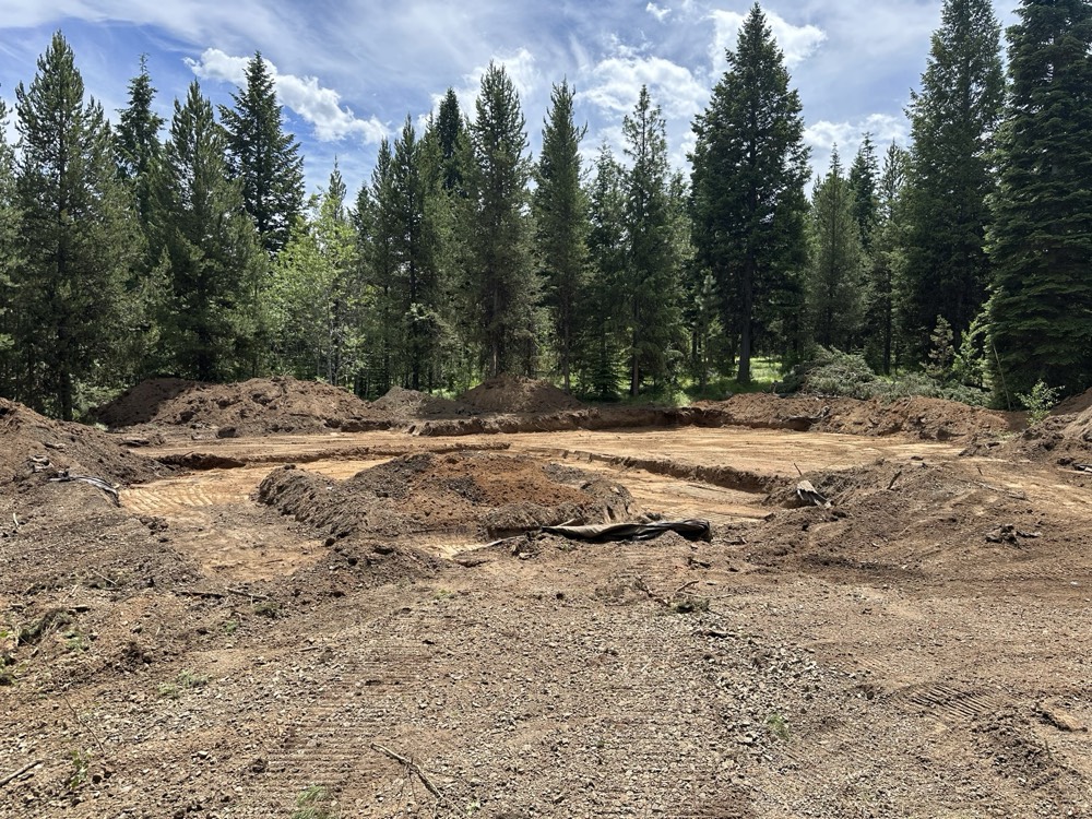 Finished foundation excavation on a wooded lot